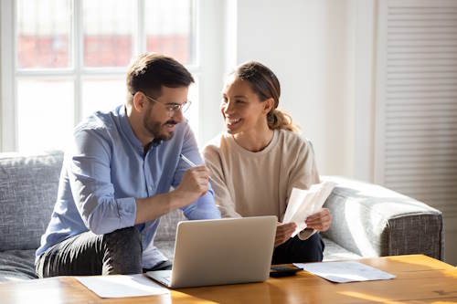 a couple discussing home insurance